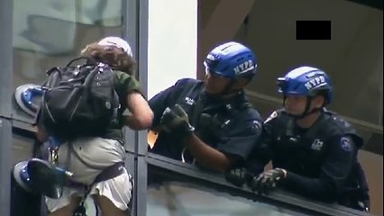 Police capture man climbing Trump Tower