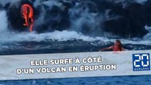 Elle surfe à côté d’un volcan en éruption
