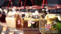Wide choice of herbal tea drinks in glass teapots standing on cafe counter. Stock Footage