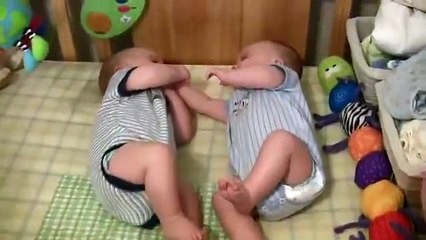 Twin Baby Boys Laughing at Each Other