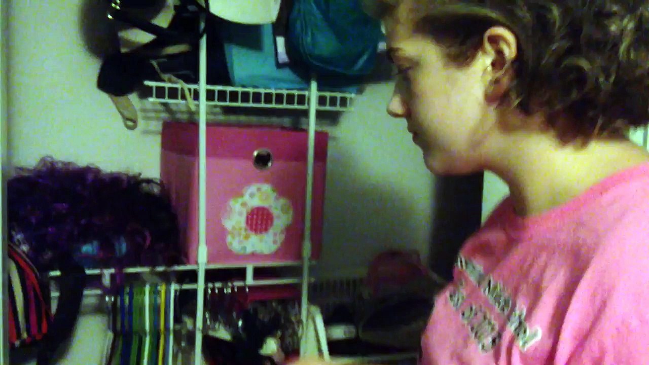 Me putting a coat on a hanger