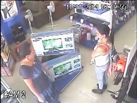 Clever Woman steals and hides Plasma TV Under her Skirt - YouTube