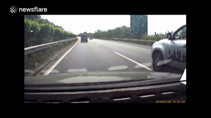 Pick-up driver throws can out of window towards car