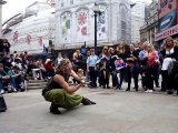Best ! !! Street performer with glass orb, on Wedding day of Prince William, Piccadilly Circus