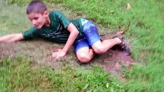 Kids Make Awesome Water Slide In Grass From Typhoon Like Rains & Have Tons of Fun