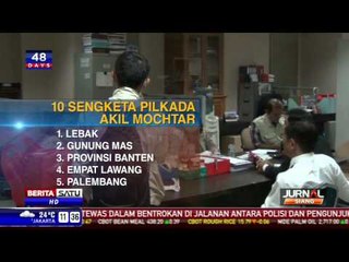 Akil Mochtar Dihadapkan Empat Perkara