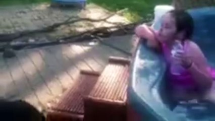Dog Catches Water that Girl Spits