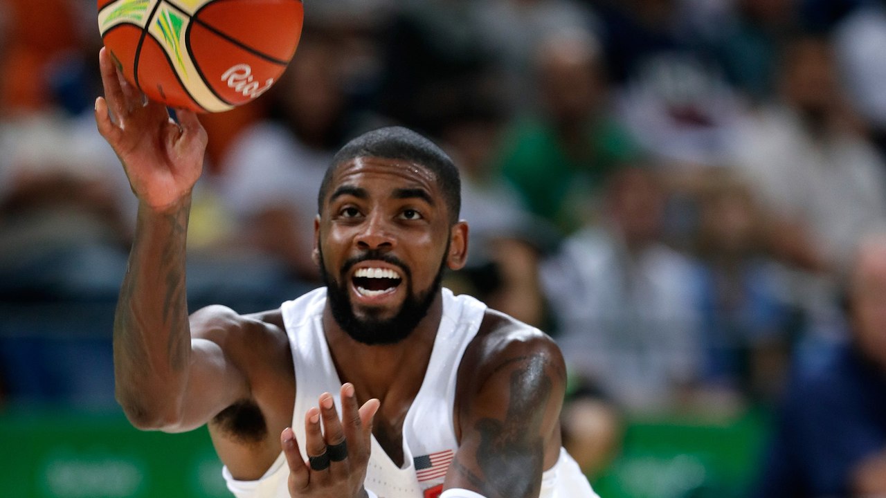 Kyrie Irving Throws Alley-Oop to Kevin Durant While Falling to the Floor