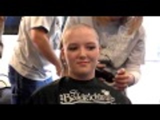 Girl headshave for St Baldrick's