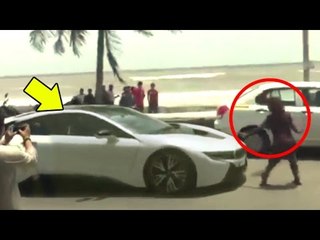 Shahrukh Khan ATTACKED By A Beggar While Driving New BMW I8