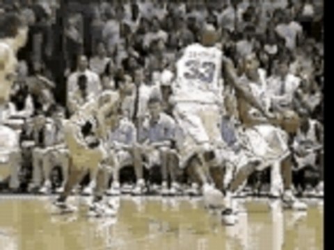 NBA - Vince Carter in North Carolina Dunks Over Tim Duncan