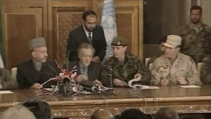 أرشيف- الحكومة الأفغانية توقع اتفاق انتشار القوات الدولية