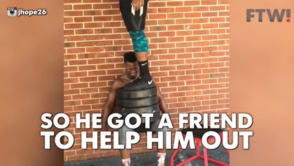 Guy performs insane wall sit workout