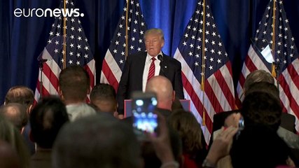 Trupm: Clinton Amerika Angela Merkele akar lenni