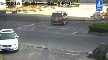 Cement truck crushes car in shocking CCTV footage