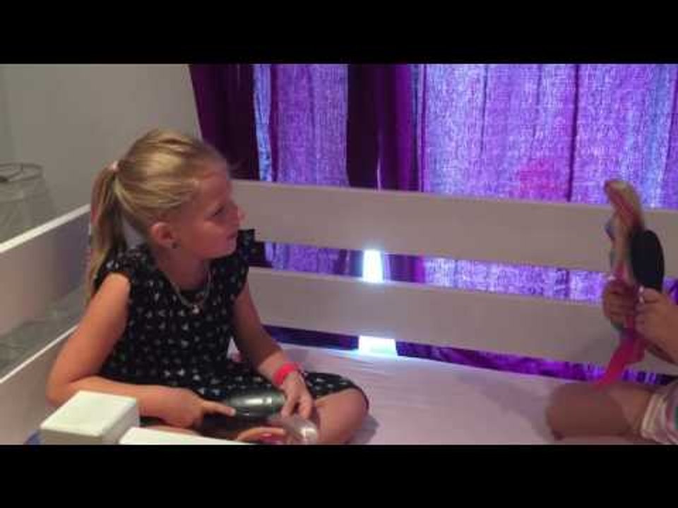 Dad Has Innovative Way to Tie Up Daughter's Dolls Hair