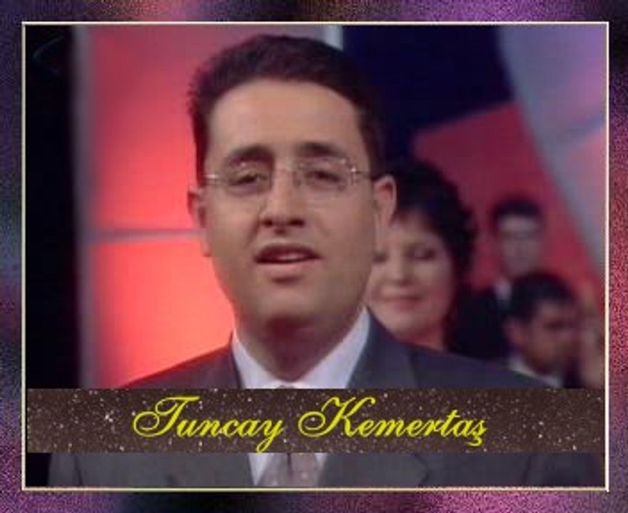 Tuncay KEMERTAŞ - Mavi Yelek Mor Düğme