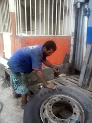 Man Inflates Tire with Fire and Pants Fall Down