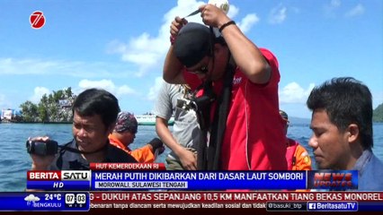 Puluhan Penyelam Kibarkan Bendera Merah Putih dari Dasar Laut