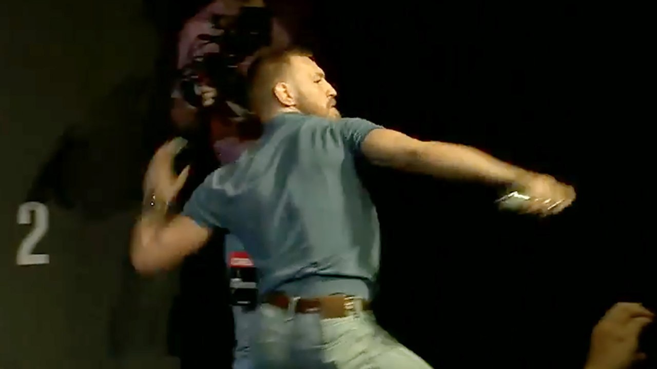 Conor McGregor & Nate Diaz Throw Bottles & Cans At Each Other At UFC 202 Press Conference