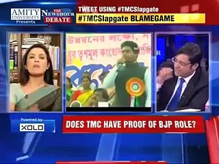 Indian politician Mahua Mitra showing center-FINGER To Anchor Arnab Goswami In Live Show