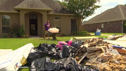 Deadly floods leave thousands homeless in Louisiana