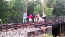 They see something on the rails. What happens next is unbelievable
