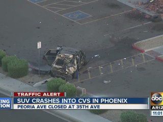 SUV crashes into Phoenix CVS