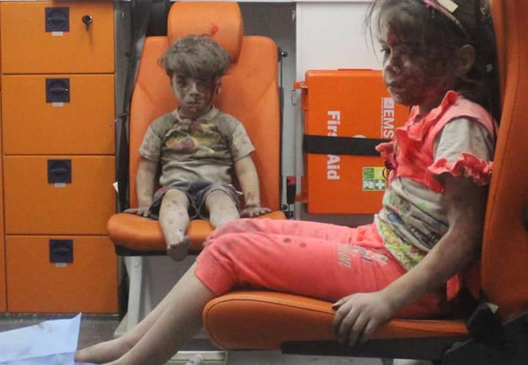 Shocking image emerges of #SyrianChild pulled from #Aleppo rubble