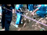 RAW: Thai officials exhume six bodies at abandoned trafficker's camp