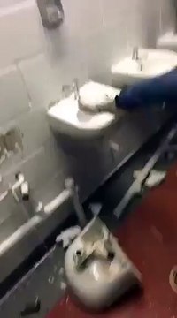 Manchester City Fans Destroy Sinks At Old Trafford Stadium