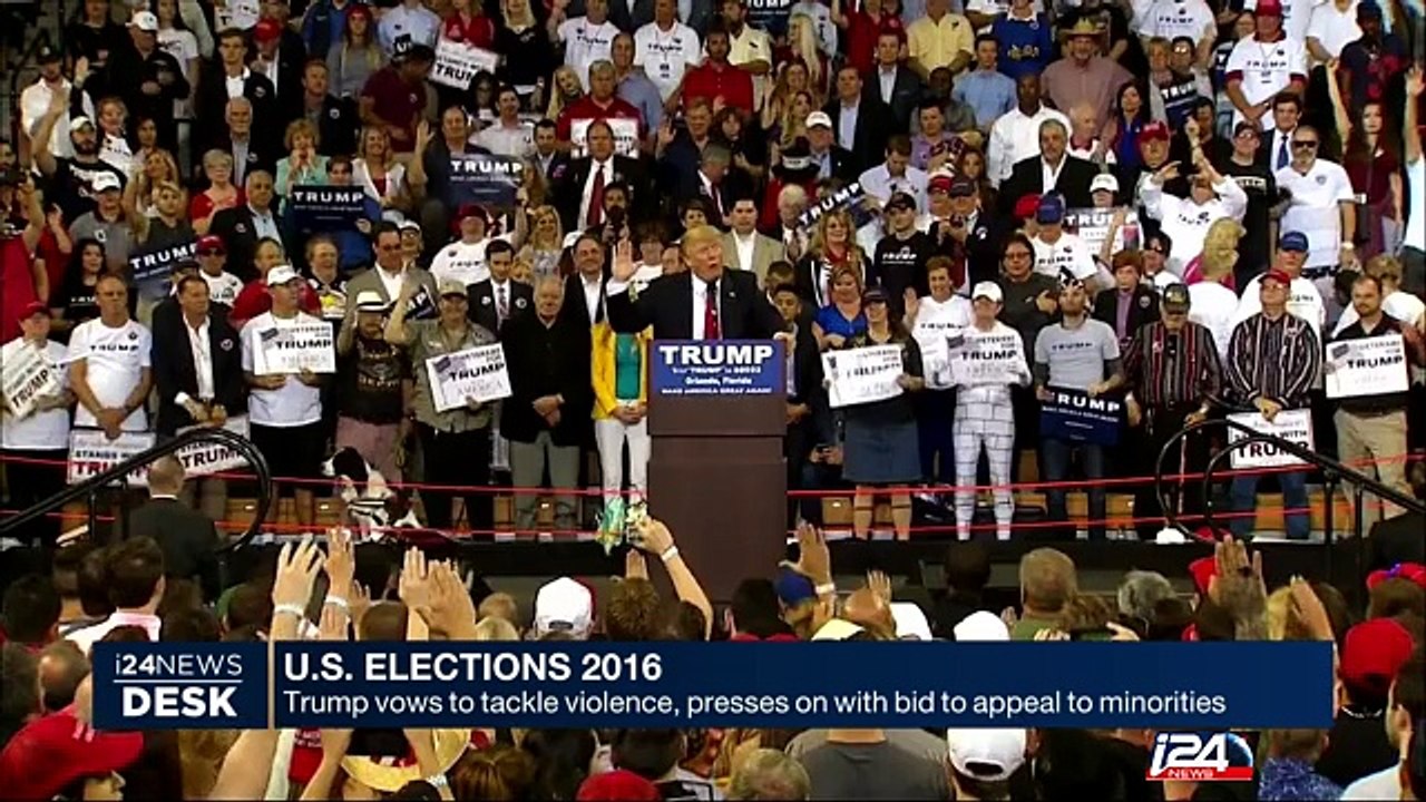 Trump vows to tackle violence, presses on with bid to appeal to minorities