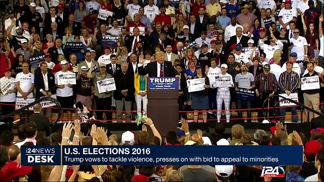 Trump vows to tackle violence, presses on with bid to appeal to minorities