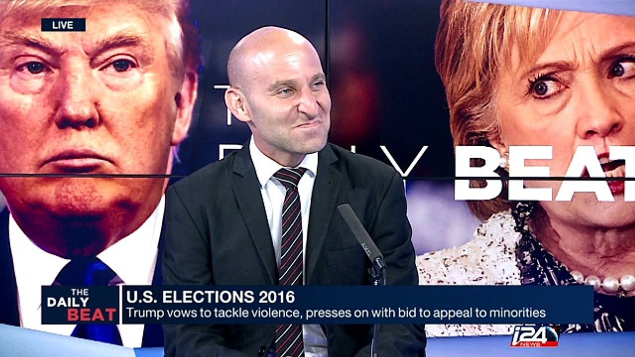 Trump vows to tackle violence, presses on with bid to appeal to minorities