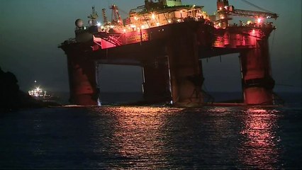 Oil rig that ran aground on Scottish beach refloated