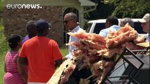 Obama visita las zonas arrasadas por las inundaciones en Luisiana