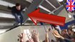 Crowd surfing fail: Fan learns how NOT to crowd jump during Wolverhampton football match - TomoNews