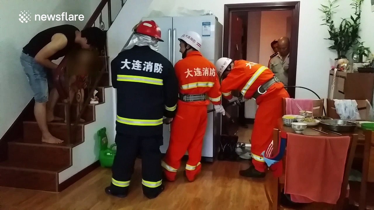 Firefighters rescue boy with head stuck in handrail