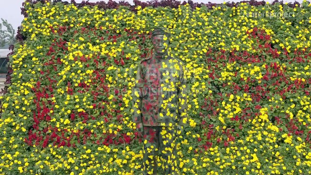 The Invisible Artist: Blending Into Liu Bolin's Paintings