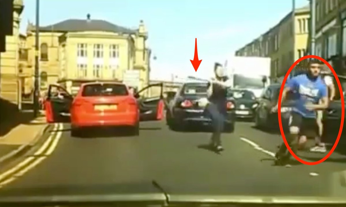 Une femme protège son mari avec une batte de baseball lors d'un road rage !