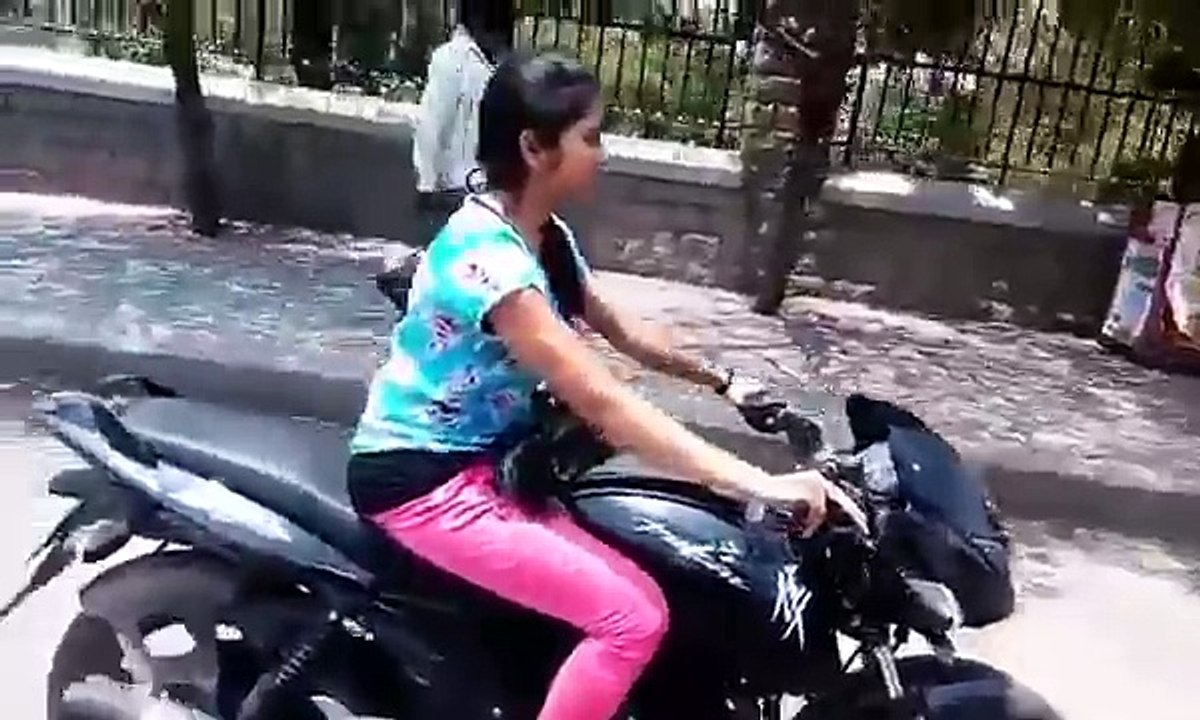 Girl Riding a PULSAR Hyderabad