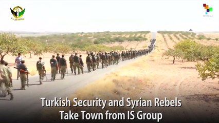 Turkish Security and Syrian Rebels Take Town from IS Group