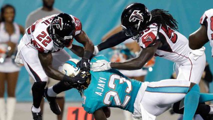 D. Led: Neal Injured in Loss to Dolphins