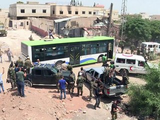 Syrie: en larmes, rebelles et civils évacuent Daraya