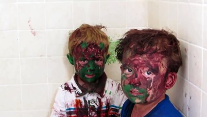 Kids play with paint a get it all over their faces