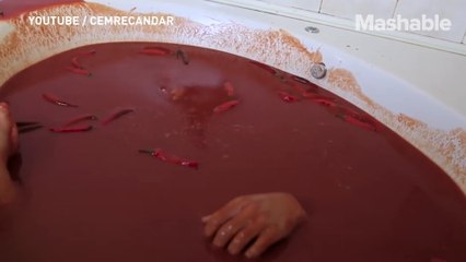 A guy jumped into a bathtub of hot sauce ... why?