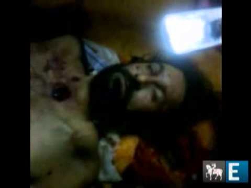 EXCLUSIVO: Opositores comemoram em torno do corpo de Kadafi