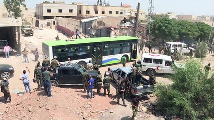 Syrie: en larmes, rebelles et civils évacuent Daraya