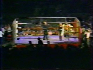 Chris Adams vs Jimmy Garvin in a Steel Cage