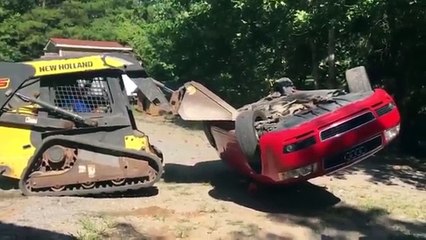 'When a dad has to prove a point' Digger smashes up Audi
